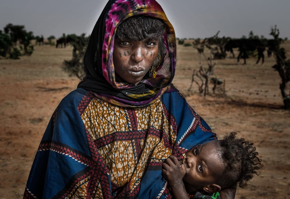 African Mother and Child by Joxe Inazio Kuesta Garmendia — canvas wall art