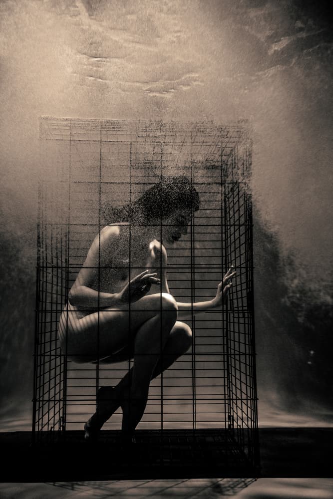 Caged Woman Underwater by Zanna — canvas wall art