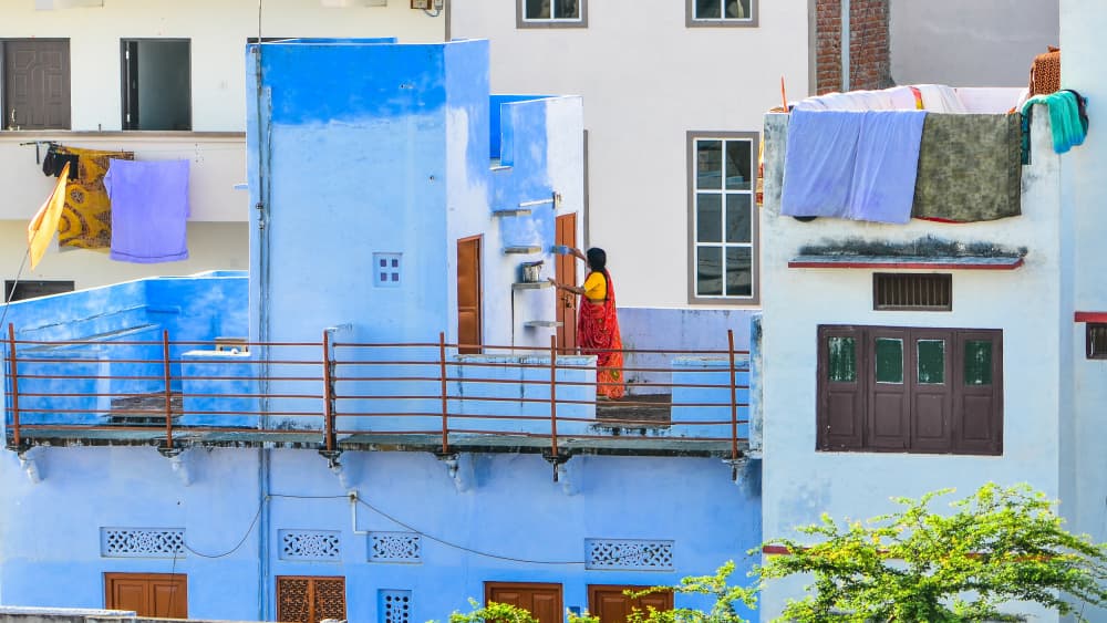 Painting the house in blue by Maryse Dardaillon — canvas wall art