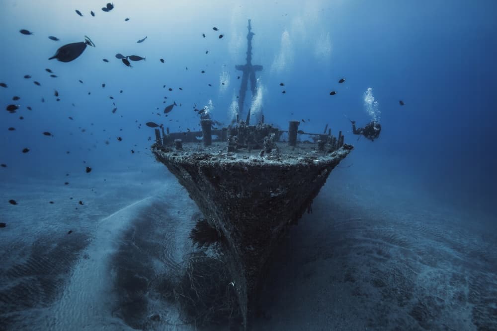 Diver Explores Sunken Wreck by Barathieu Gabriel — canvas wall art