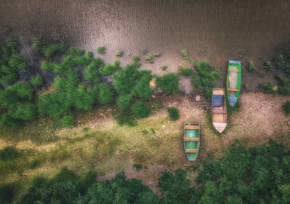 Overhead Boats Riverbank by Guy Krier — canvas wall art