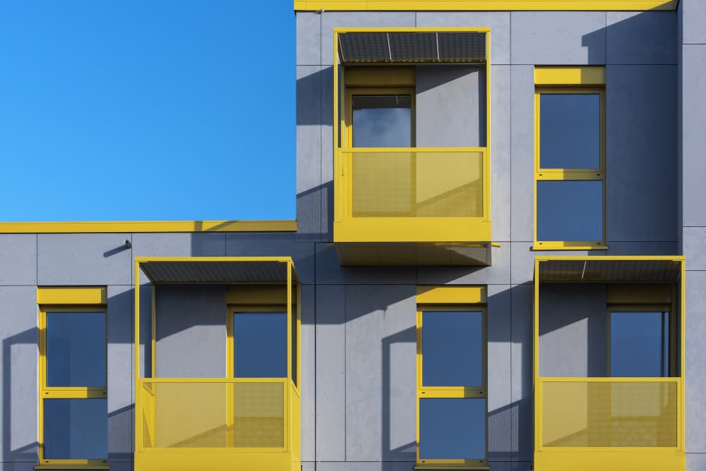 Yellow Balconies Blue Sky by Georges Forster — canvas wall art