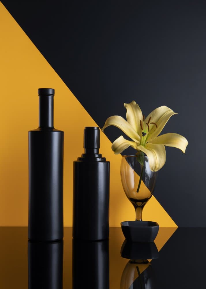 Black Bottles Golden Lily by Ming Chen — canvas wall art