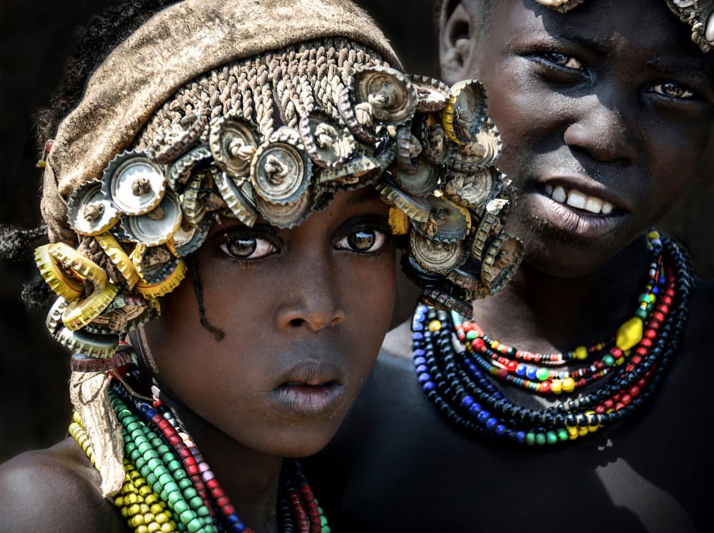 Expressive Tribal Children by Irene Perovich — canvas wall art