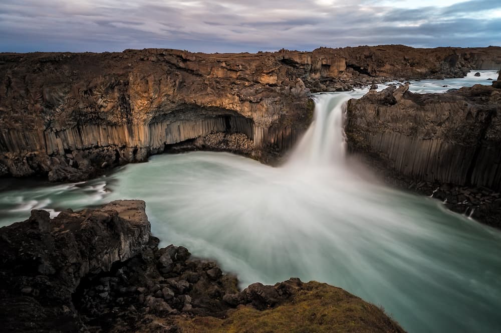 Dramatic Basalt Waterfall by Karsten Wrobel — canvas wall art