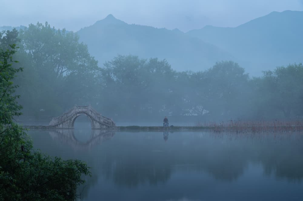 Misty Lake Stone Bridge by Lian Tang — canvas wall art