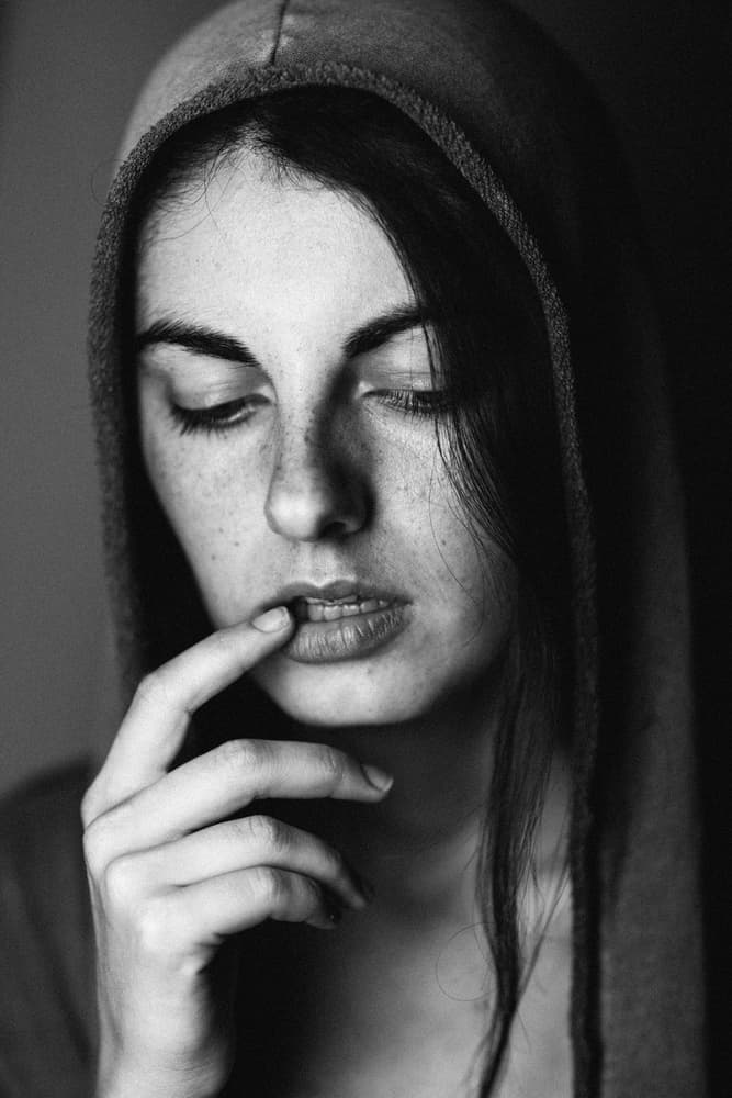 Pensive Hooded Woman by Artem Vasilenko — canvas wall art