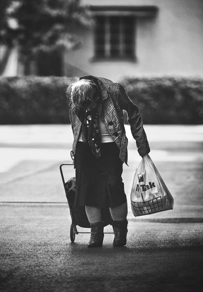 Elderly Shopper's Burden by Samir Pajic — canvas wall art
