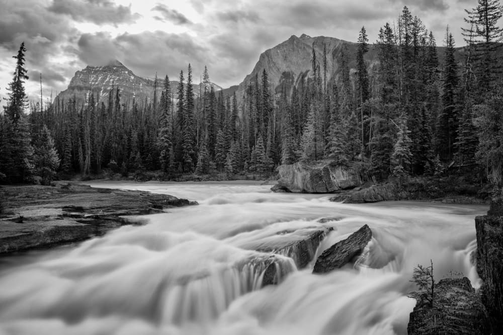 Monochrome Mountain River Flow by Ali Khataw — canvas wall art