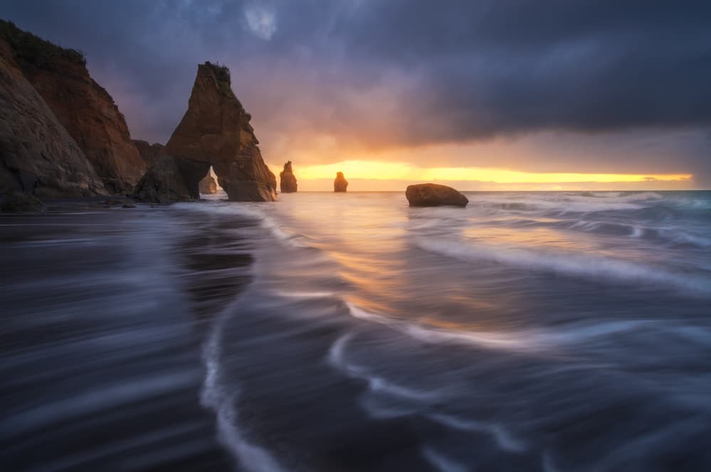 Dramatic Coastal Arch Sunset by Tim Fan — canvas wall art