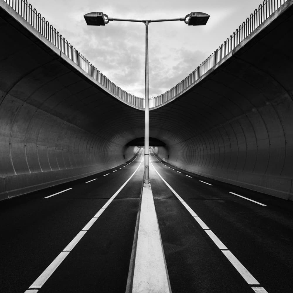 Symmetrical Tunnel Road by Jonathan Lai — canvas wall art