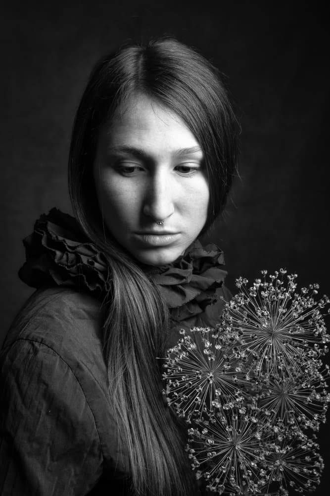 Pensive Woman with Alliums by Ruth Franke — canvas wall art