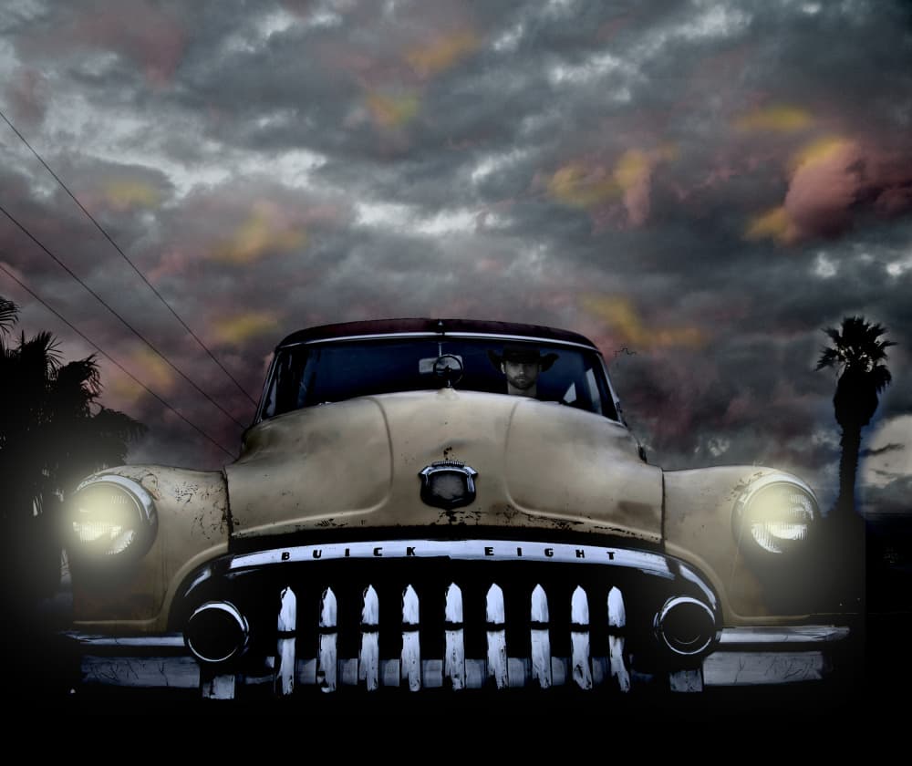 Vintage Car Stormy Sky by LARRY BUTTERWORTH — canvas wall art