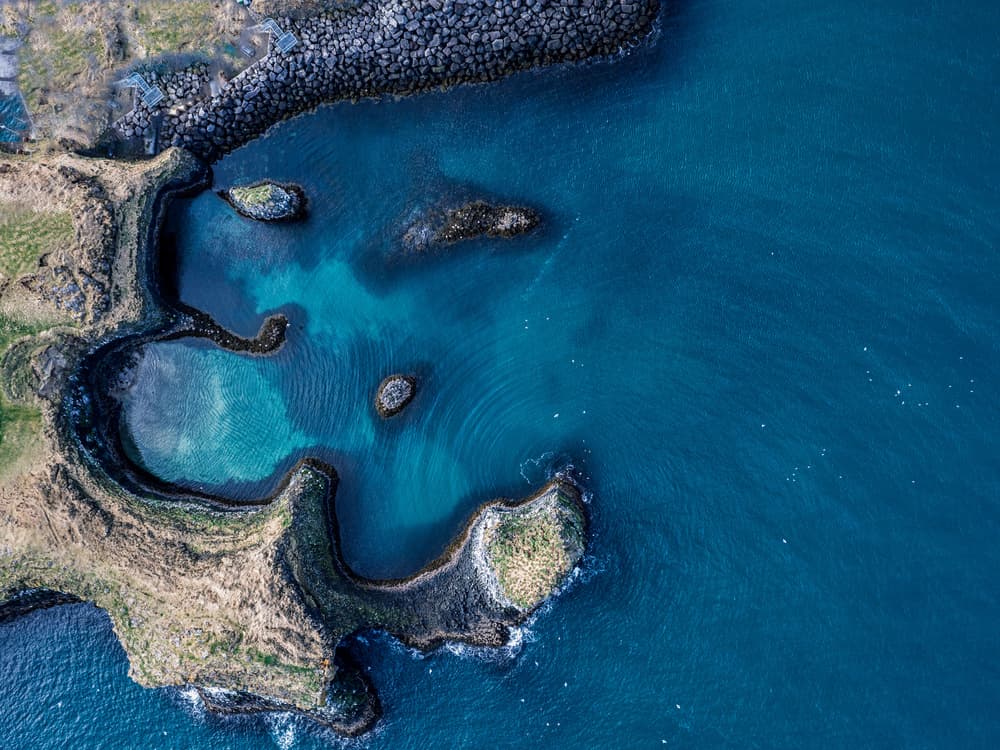 Turquoise Coastal Cove by Dennis Zhang — canvas wall art