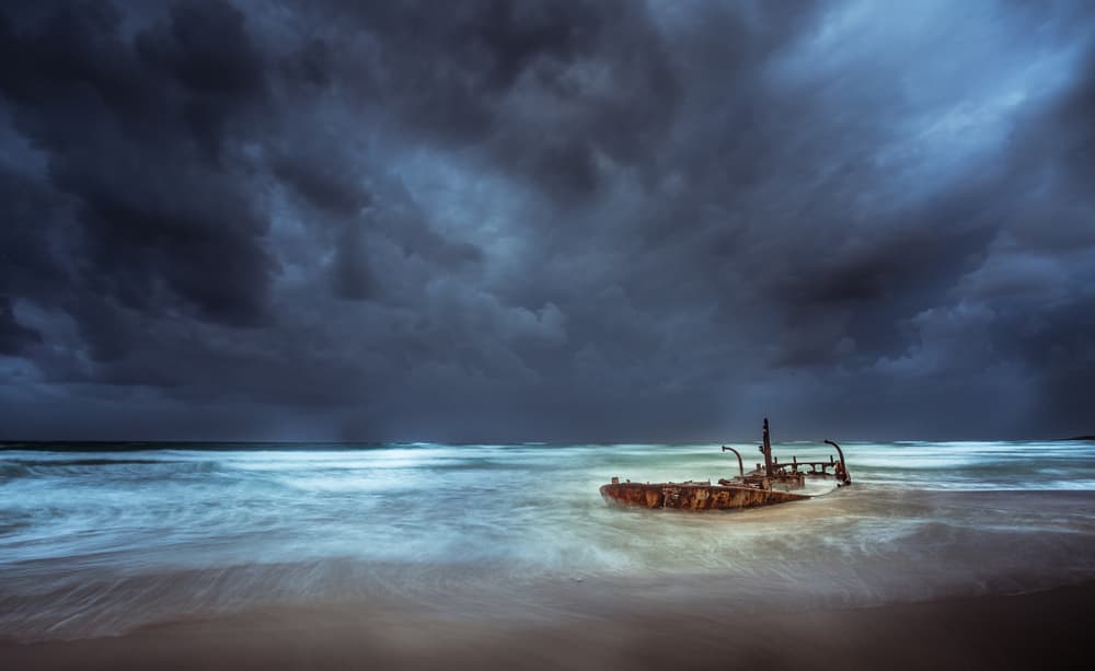 Stormy Shipwreck Shore by Wisam Hassan — canvas wall art