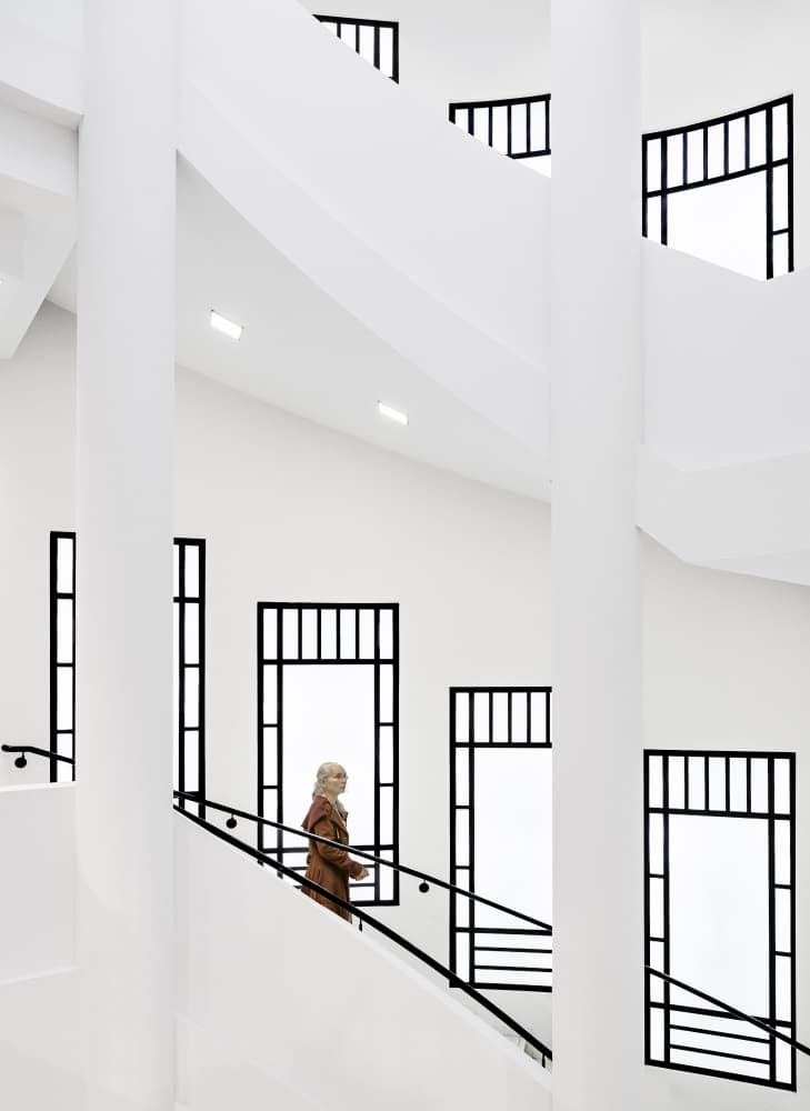 Woman on Modern Staircase by fotomarion — canvas wall art