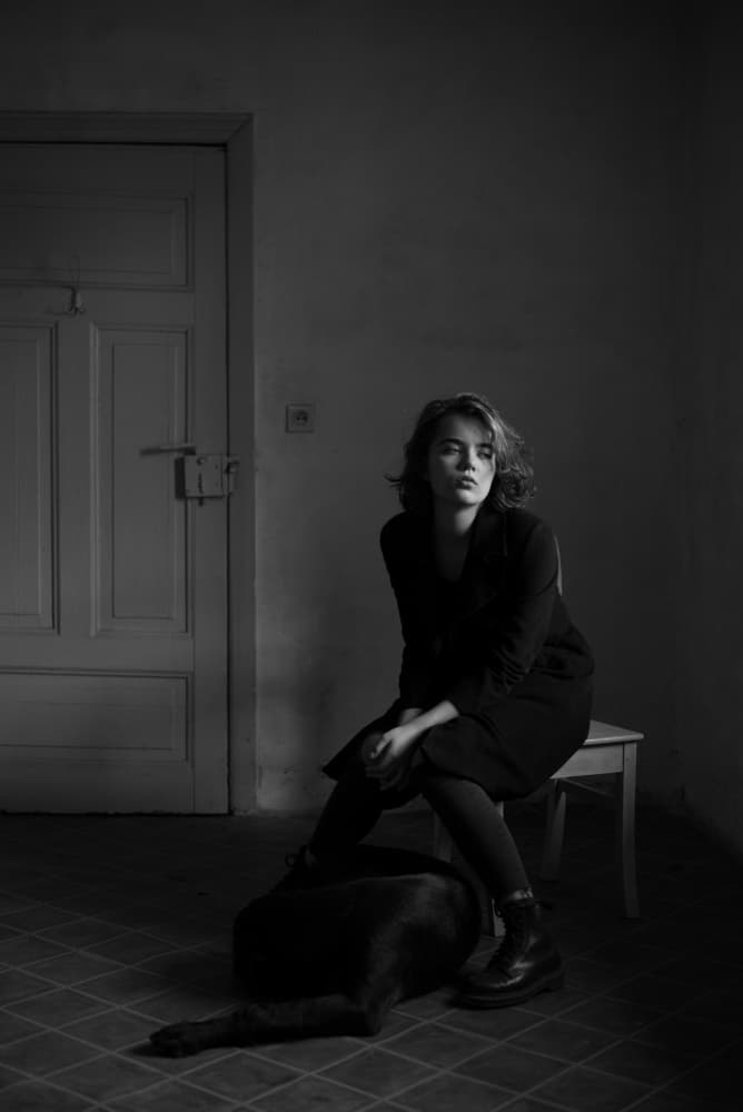 Pensive Woman Black Dog by Małgorzata Masarz — canvas wall art