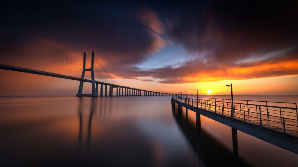 Sunset Bridge Reflection by Gonçalo Capitão — canvas wall art
