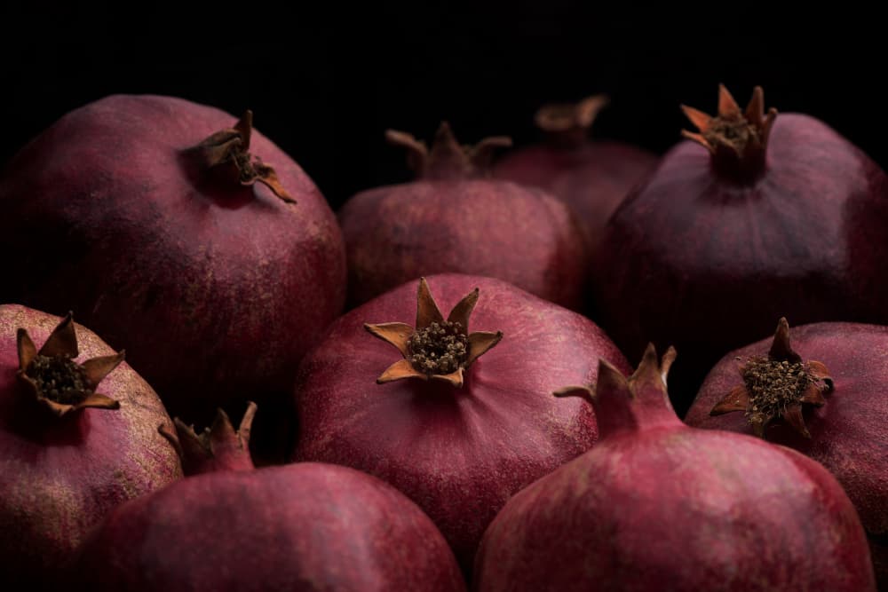 Rich Red Pomegranates by Saleh Swid — canvas wall art