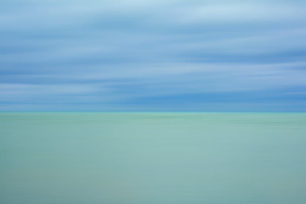 Calm Ocean Horizon by Susan Merritt — canvas wall art