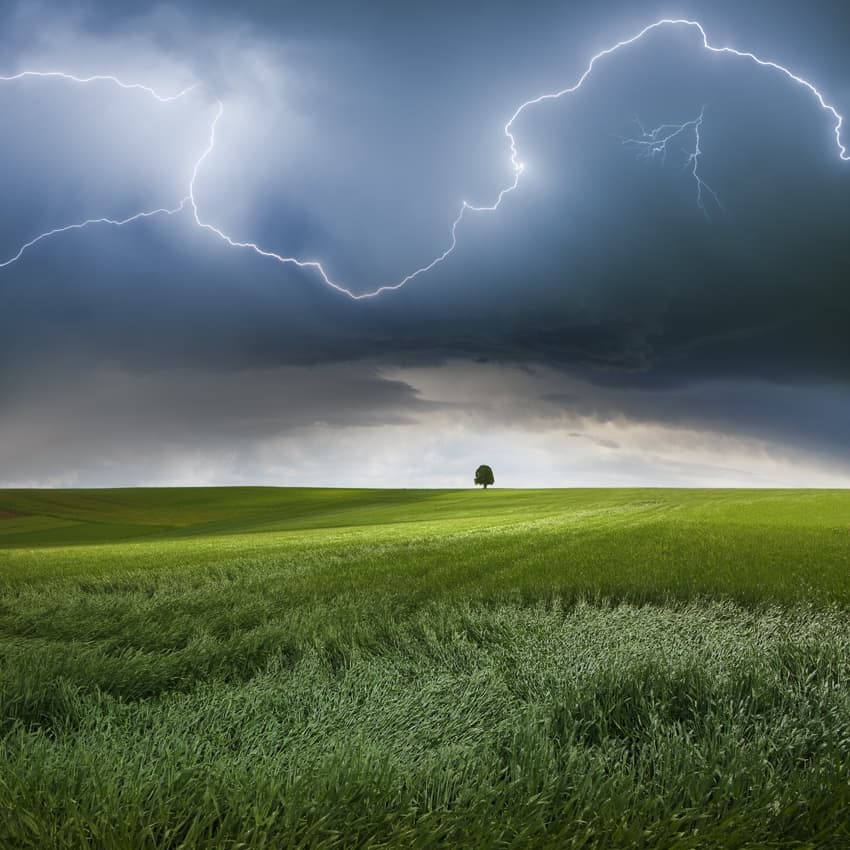 Dramatic Storm Over Field by Nicolas Schumacher — canvas wall art