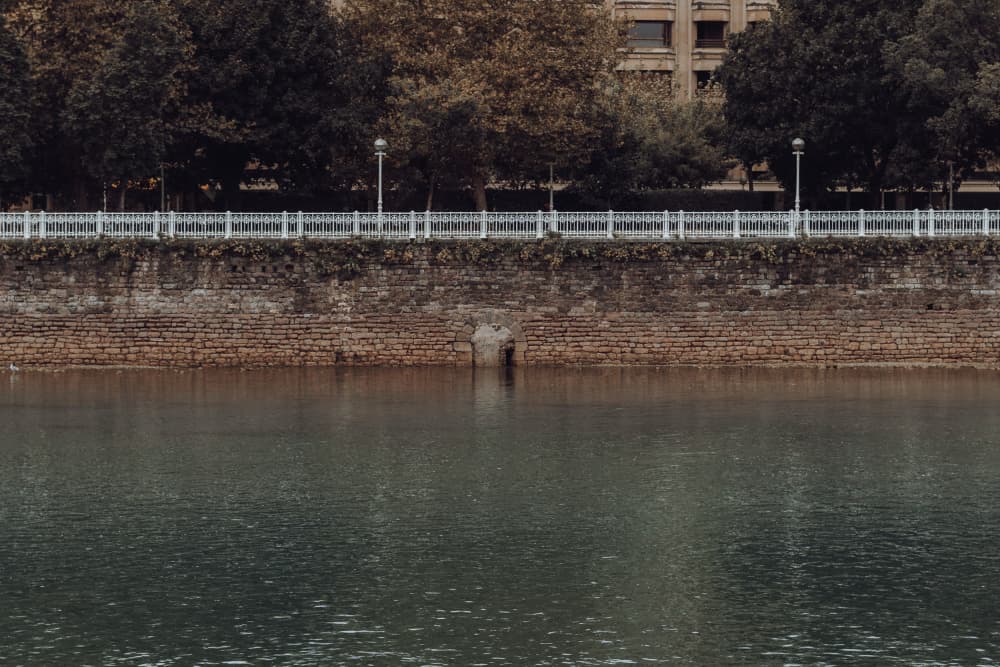 Calm City River by Aimee Giles — canvas wall art