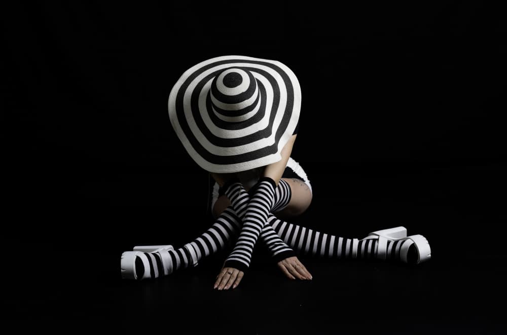 Striped Hat Pose by Shlomo Waldmann — canvas wall art
