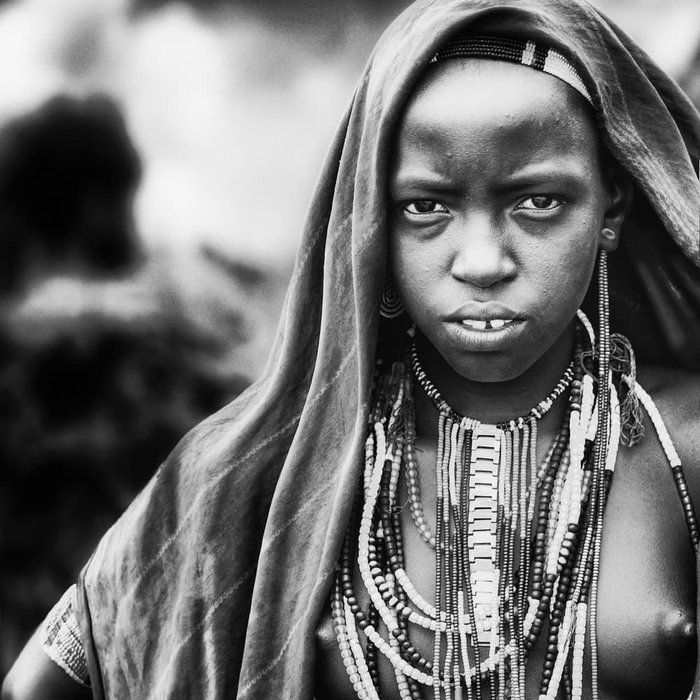 African Woman Portrait by Piet Flour — canvas wall art