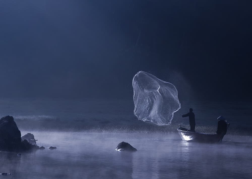 Misty Lake Fisherman by Nunu Rizani — canvas wall art