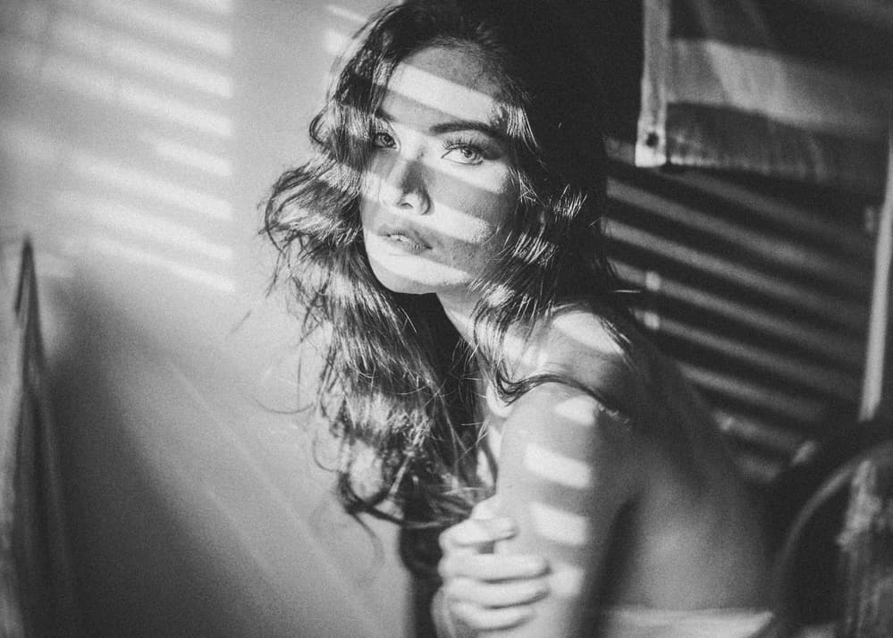 Pensive Woman In Shadows by ADIREK M — canvas wall art