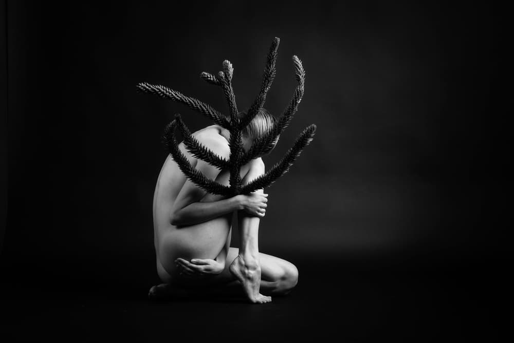 Mysterious Figure with Branches by Axel K. Schoeps — canvas wall art