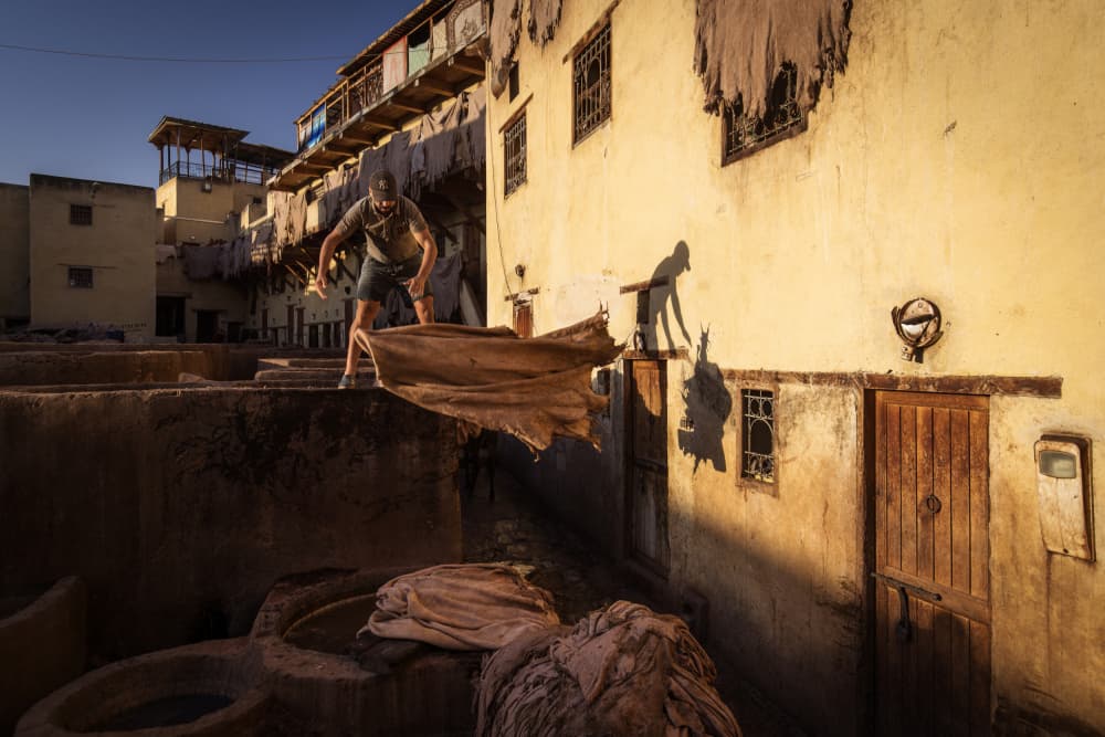 Moroccan Tannery Worker by Dan Mirica — canvas wall art