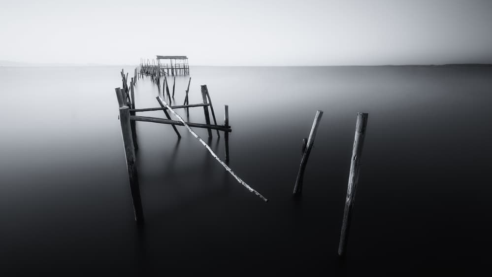 Forgotten Wooden Pier by Iván Ferrero — canvas wall art