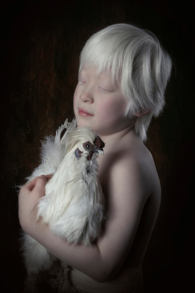 Child with Silkie Chicken by Carola Kayen-Mouthaan — canvas wall art