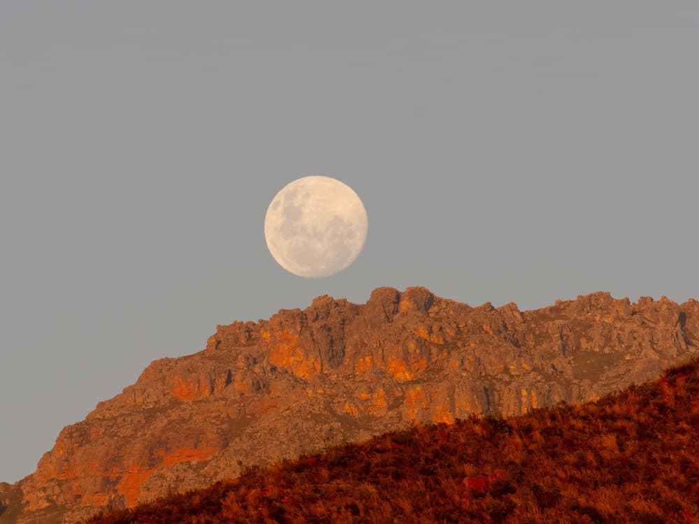 Moon Over Golden Peaks by Dirk Lombard — canvas wall art