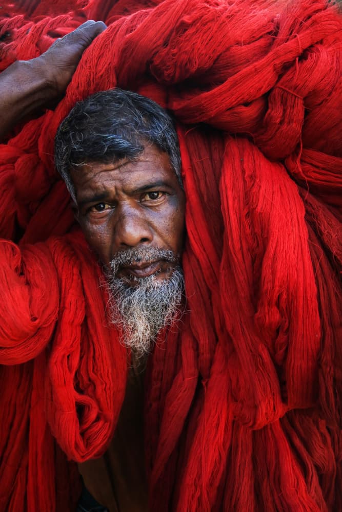 Red Yarn Portrait by Ummu Nisan Kandilcioglu — canvas wall art