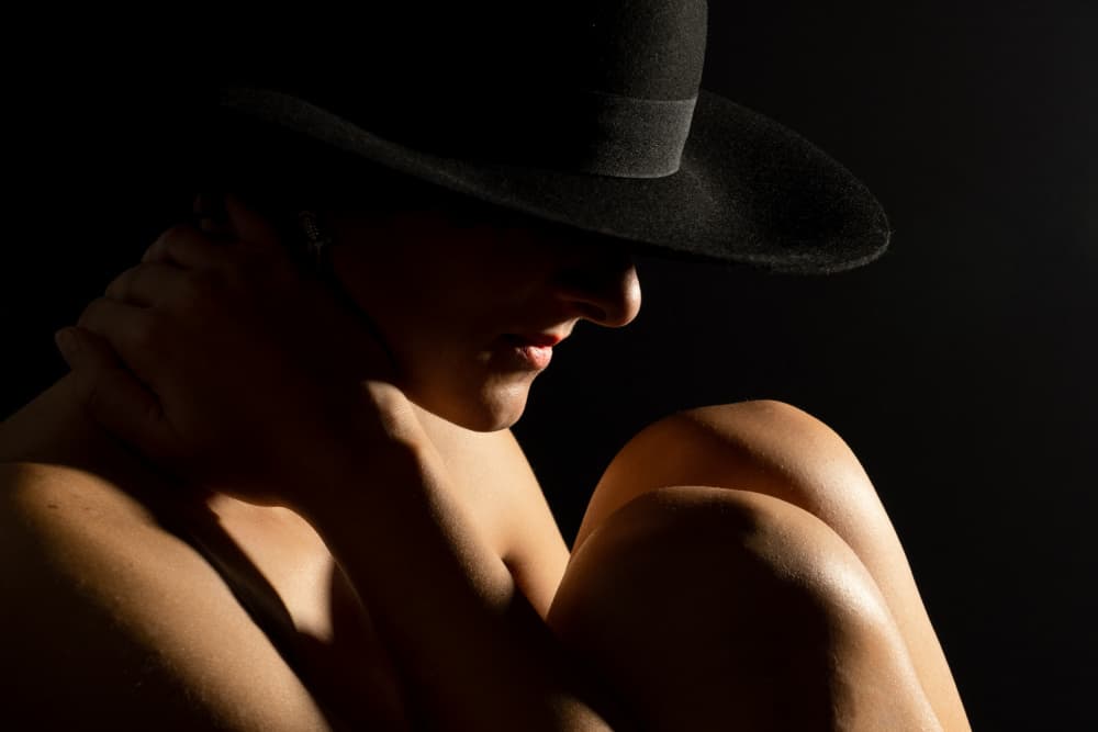 Mysterious Woman In Hat by Olivia Popescu — canvas wall art