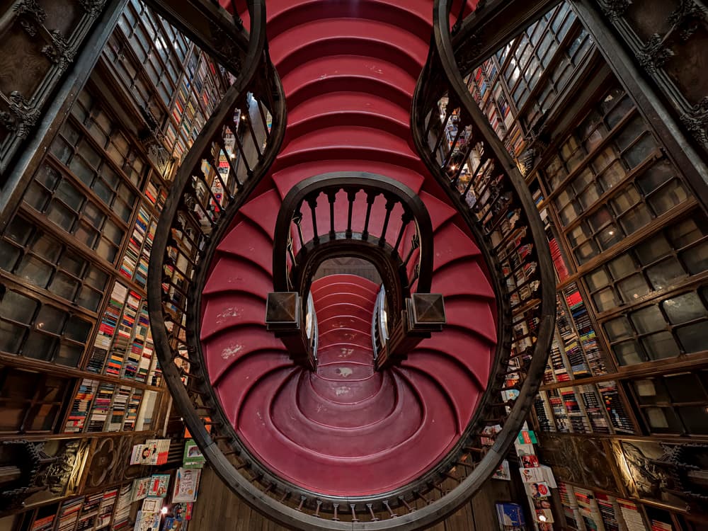 Red Spiral Library Stairs by Carlos Costa — canvas wall art