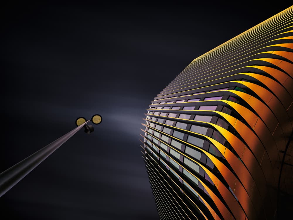 Golden Facade at Night by Karol Važan — canvas wall art