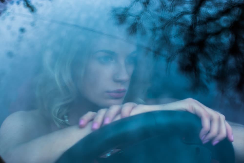Thoughtful Woman In Car by Colin Dixon — canvas wall art