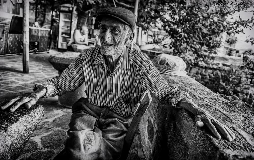 Smiling Elderly Man by Ömer Ates Kızıltug — canvas wall art