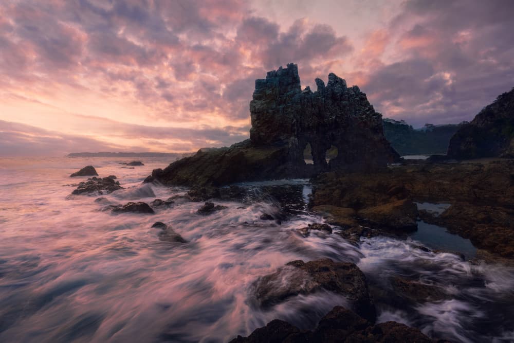 Pink Sky Coastal Rocks by Leah Xu — canvas wall art