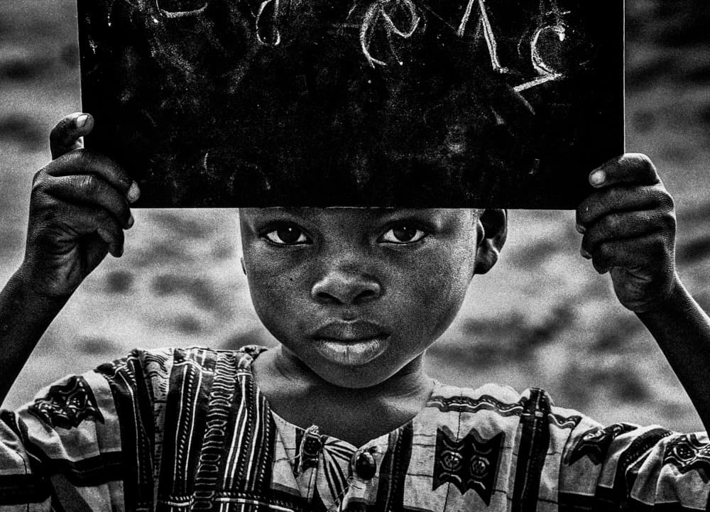 Child's Chalkboard Gaze by Joxe Inazio Kuesta Garmendia — canvas wall art