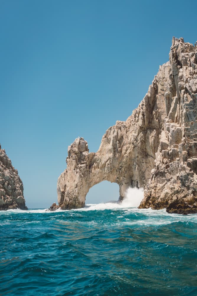 Waves Crashing Sea Arch by Bethany Young — canvas wall art
