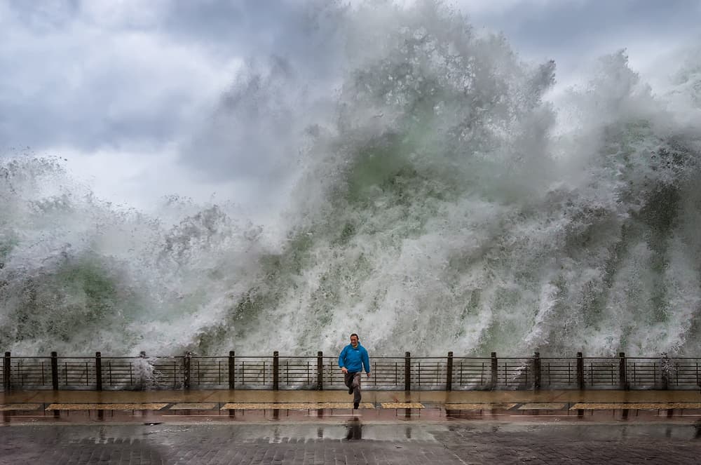 Man Against Waves by Vladi Garcia — canvas wall art