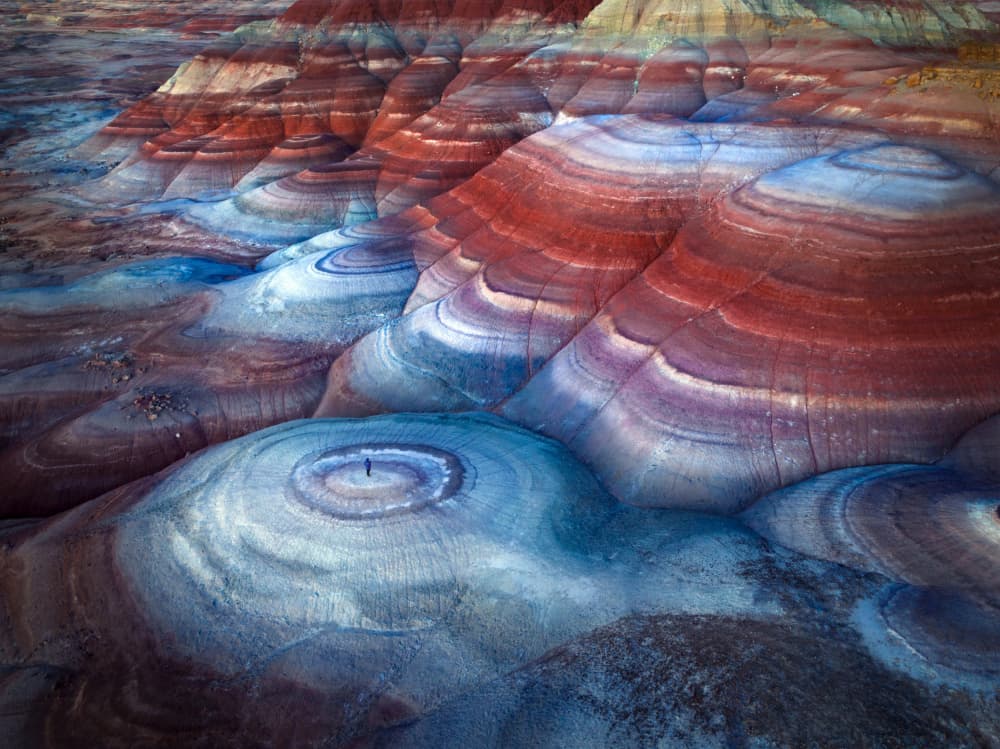 Vibrant Desert Swirls by Karol Nienartowicz — canvas wall art