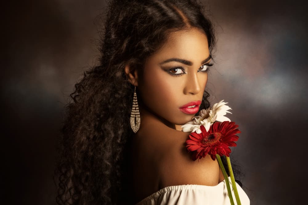 Woman with Red Flowers by Peppe Tambè — canvas wall art