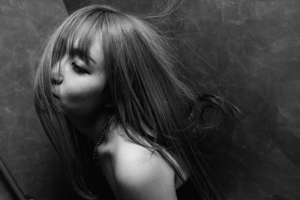 Serene Woman Flowing Hair by Takaaki Ishikura — canvas wall art