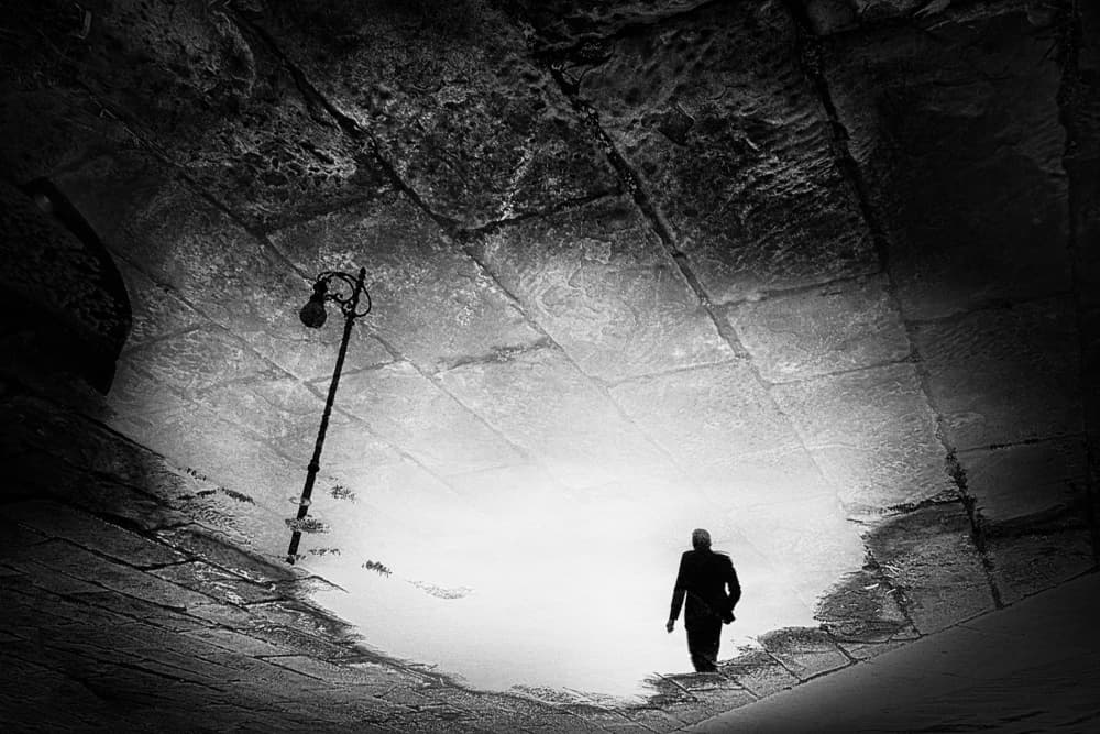Lone Man Reflection by Damijan Sedevcic — canvas wall art