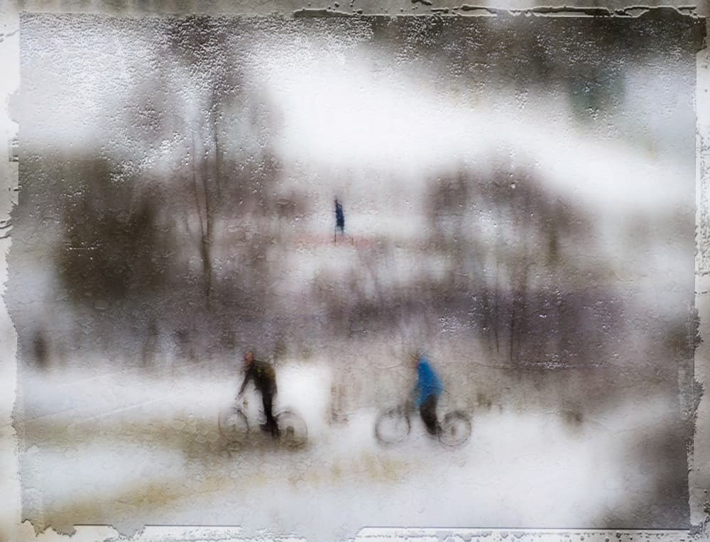 Blurred Winter Cyclists by Amer Jassim — canvas wall art